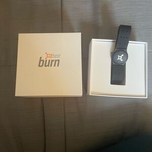 OTbeat Burn heart rate monitor with original packaging.